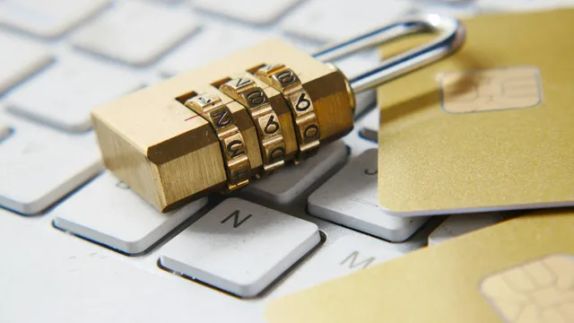 Golden padlock sitting on top of a laptop keyboard, representing data protection regulation