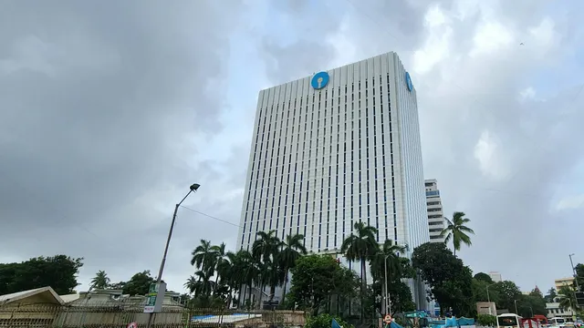 Bank corporate office tower in Mumbai's financial district, representing RBI regulated banks and NBFCs preparing for VAPT